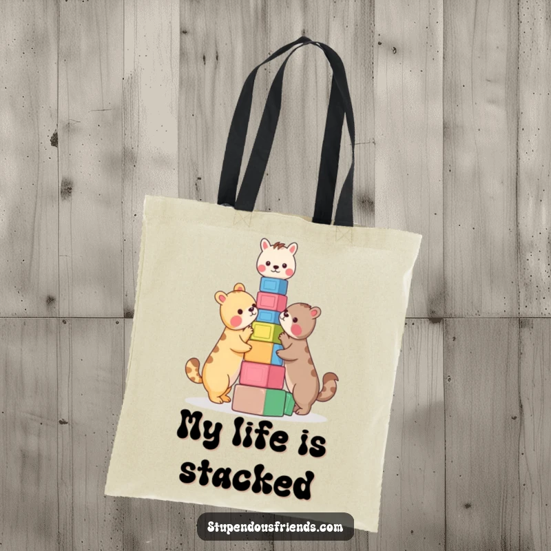 Funny Tote Bag: Two animals building a colorful block tower together. This practical and funny tote bag is perfect for everyday use.